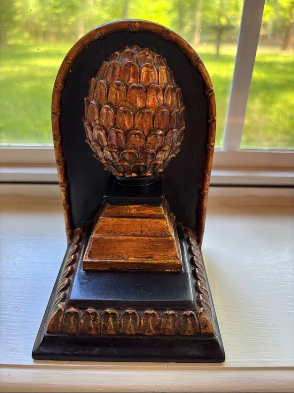 Set Of Bookends Featuring Pineapple Finial Design Atop A Tiered Base.